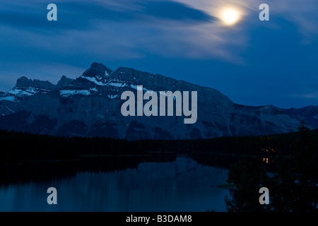 Moonrise over Mount Rundle in Banff National Park Stock Photo