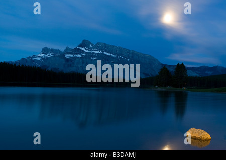 Moonrise over Mount Rundle in Banff National Park Stock Photo