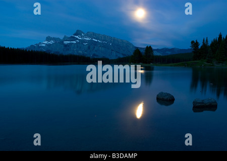 Moonrise over Mount Rundle in Banff National Park Stock Photo