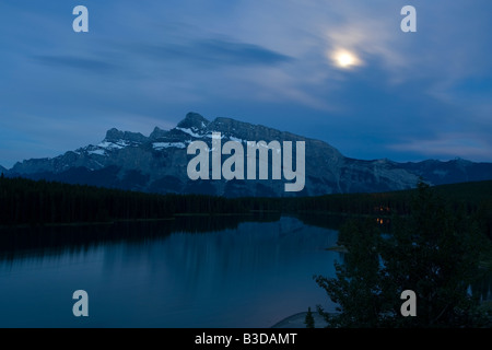 Moonrise over Mount Rundle in Banff National Park Stock Photo