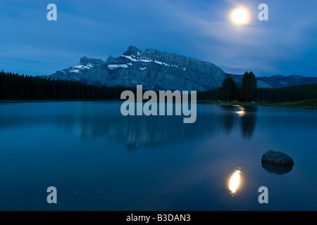 Moonrise over Mount Rundle in Banff National Park Stock Photo