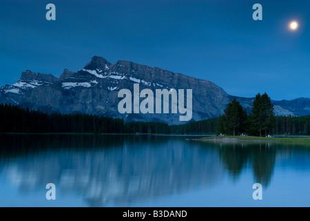 Moonrise over Mount Rundle in Banff National Park Stock Photo