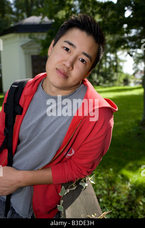Young man in red jacket Stock Photo