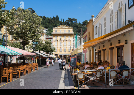 Restaurants by the Marche aux Fleurs in Cours Saleya in the old town (Vieux Nice), Nice, Cote d'Azur, French Riviera, France Stock Photo