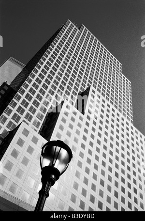 Glass office building with street lamp black & white Stock Photo
