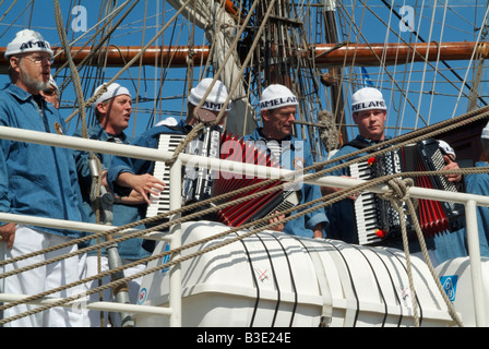 The Dutch Amelander Shanty Choir singing aboard the tall ship Artemis Stock Photo