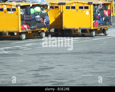 passenger luggage being transported at airport Stock Photo