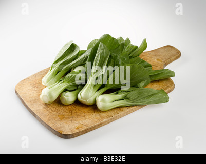 Bok choy, Chinese celery cabbage on chopping board Stock Photo