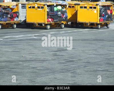 passenger luggage being transported at airport Stock Photo