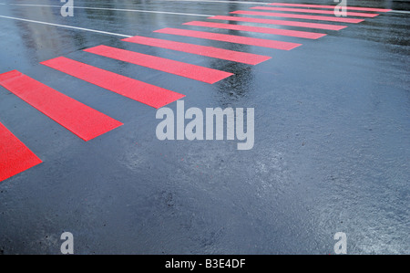 drops of rain water on a fresh asphalt Stock Photo