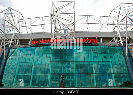 outside the main entrance to old trafford, home of the famous manchester united football club,manchester,uk