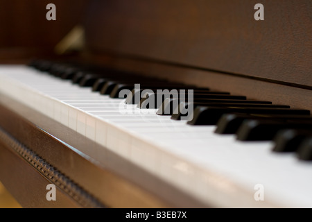 Piano keys of an upright piano Stock Photo