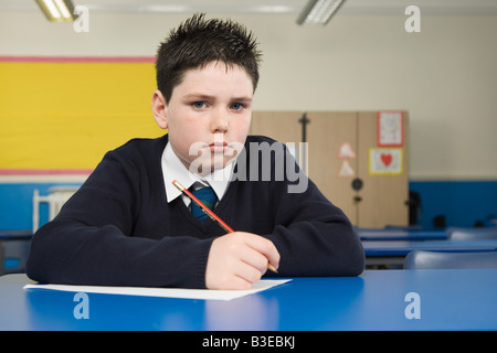 Boy in classroom Stock Photo