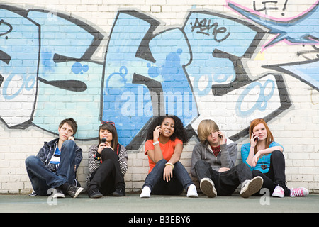 Teenagers on cellphones Stock Photo