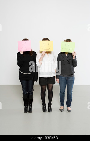 Women with drawn faces Stock Photo