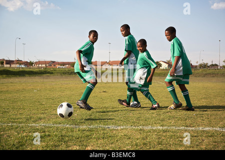 13MA-033 © Monkeyapple  aFRIKA Collection  Great Stock !  Young team playing soccer Stock Photo