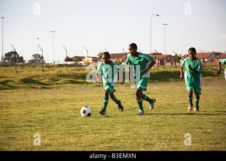 13MA-034 © Monkeyapple  aFRIKA Collection  Great Stock !  Young team playing soccer Stock Photo