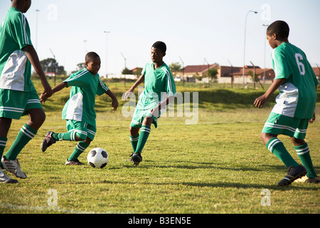 13MA-035 © Monkeyapple  aFRIKA Collection  Great Stock !  Young team playing soccer Stock Photo