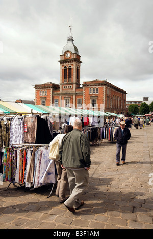 UK Derbyshire Chesterfield Town centre shoppers in Market Square below Victorian Market Hall Stock Photo