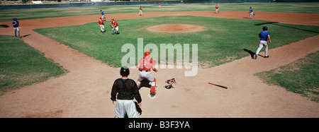 Baseball players on playing field Stock Photo