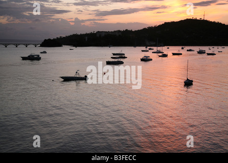 Fisherman boats at sunset in the Samana Bay near Santa Barbara de Samana, Dominican Republic Stock Photo