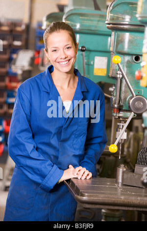 Machinist working on machine Stock Photo