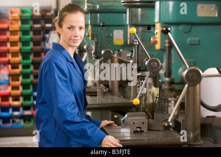 Machinist working on machine Stock Photo