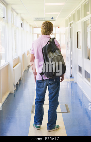 Student standing in corridor (selective focus) Stock Photo