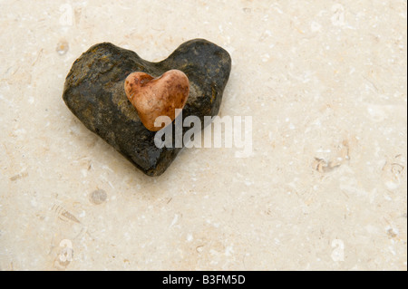 Stone hearts left Stock Photo