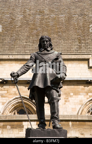 The statue of Oliver Cromwell (1599-1658) that stands outside of the Houses of Parliament in Westminster, England. Stock Photo