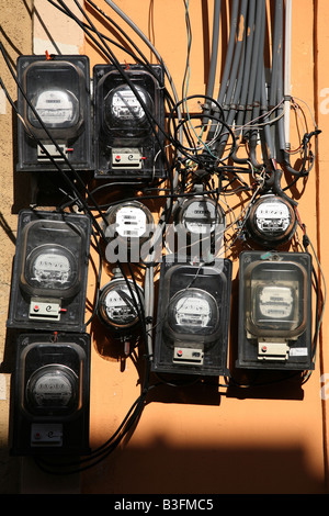 Electric meters on the wall in the Zona Colonial of Santo Domingo, Dominican Republic Stock Photo