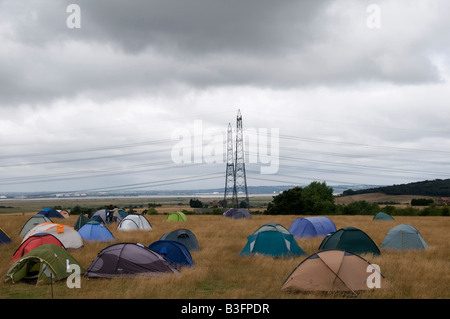 August 8th 2008 Climate Camp near Kingsnorth Power station Kent View of tents and power lines Stock Photo