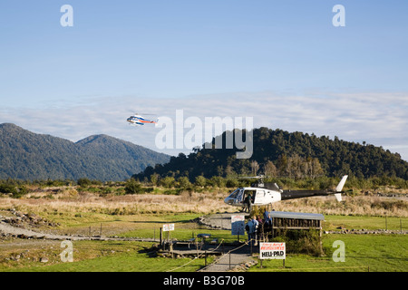 Franz Josef New Zealand Heliservices Heli pad helicopters for tourist's sightseeing flights over Southern Alps Stock Photo