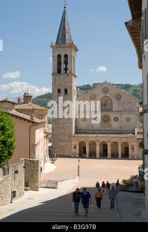 Spoleto Cathedral in the Piazza del Duome is dedicated to Santa Maria Assunta. The facade is one of the most superb examples of Umbrian Romanesque. The Romanesque edifice contains the tomb of Filippo Lippi, who died in Spoleto in 1469, designed by his son Filippino Lippi. The church also houses a manuscript letter by Saint Francis of Assisi Stock Photo