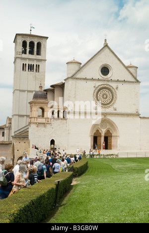 Basilica of St. Francis, Assisi. The Franciscan monastery (Sacro Convento) and the lower and upper church (Basilica inferiore e superiore) of St Francis were begun immediately after his canonization in 1228. Simone di Pucciarello donated the land for the church, a hill at the west side of Assisi, known as 'Hill of Hell' (it. Collo d'Inferno - here the criminals were put to death). Today, this hill is aptly called 'Hill of Paradise'. Stock Photo