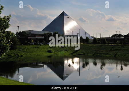 Reflection of the Pyramid Arena in a pond on a sunny summer evening in downtown Memphis, TN, USA. Stock Photo