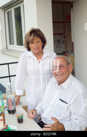 ELDERLY COUPLE HAVING FUN AT HOME Stock Photo