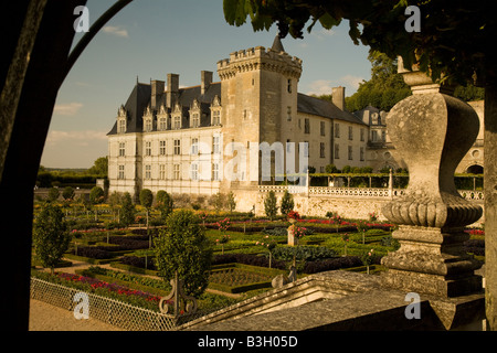 Late afternoon sunshine falls on the west face of Chateau Villandry and lower, potager (vegetable) gardens, Loire Valley, France Stock Photo