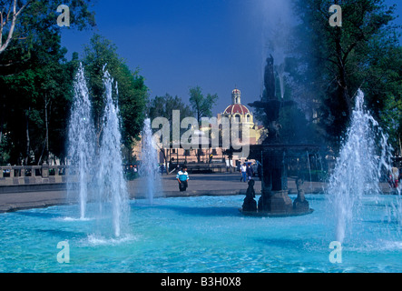 water fountain, water fountains, Mexican people walking in Central Alameda Park a public park in Mexico City, Federal District, Mexico Stock Photo