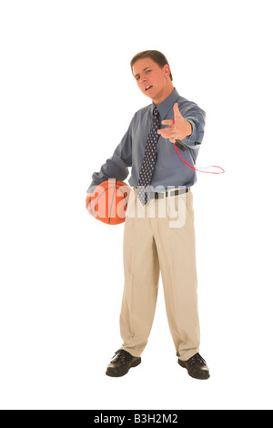 Man in holding basket ball and whistle Stock Photo