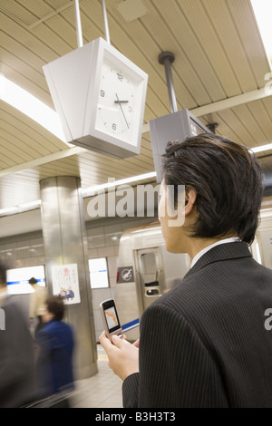 Businessman using mobile phone Stock Photo