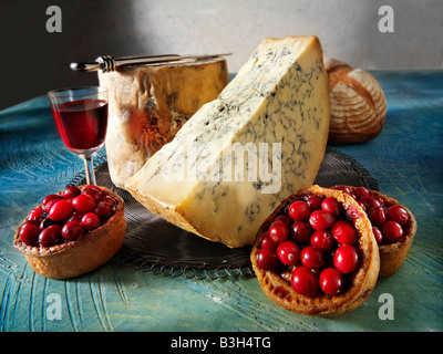 Whole Organic stilton with Cranberry topped pork pies. Christmas food Stock Photo