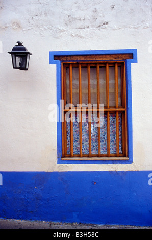 Window of a colorful Spanish colonial style house in Caracas, Venezuela Stock Photo