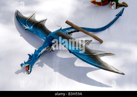 Painted flying winged dragon for sale. Dragon Festival Lake Phalen Park St Paul Minnesota USA Stock Photo