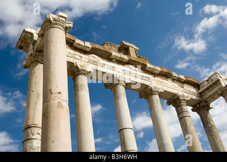 Eight surviving Doric columns of the Temple of Saturn on the Roman Forum in Rome Italy Stock Photo