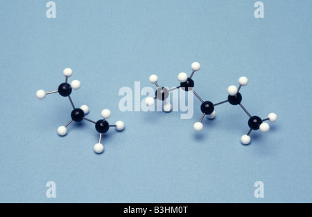 ball and stick molecular models of propane (left) pentane (right) Stock Photo