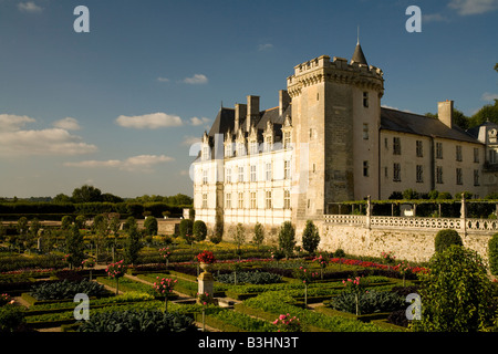 Late afternoon sunshine falls on the west face of Chateau Villandry and lower, potager (vegetable) gardens, Loire Valley, France Stock Photo