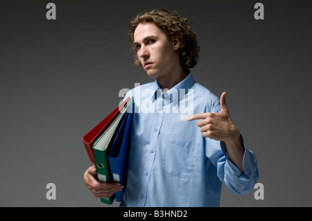Young man with files on his head Stock Photo