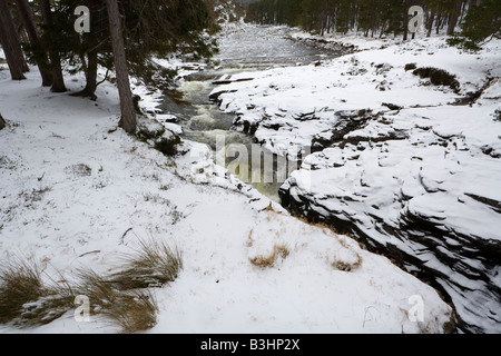 The River Dee flowing through the rocky ravine of the Linn of Dee in winter snow, west of Braemar, Aberdeenshire, Scotland Stock Photo