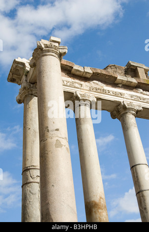 Eight surviving Doric columns of the Temple of Saturn on the Roman Forum in Rome Italy Stock Photo